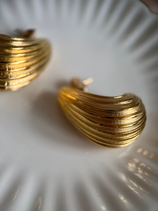 18k gold plated Ribbed Curved Earrings - Gold Lunar on jewellery dish