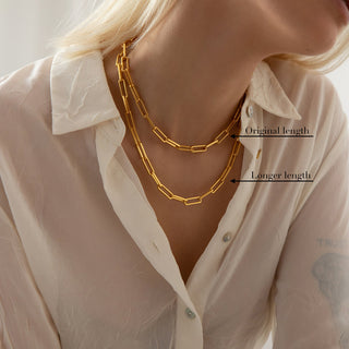 18k Gold plated brass Paperclip Chain worn by a model wearing a semi see-through shirt from ZARA with the buttons undone showing two lengths of the same chain.