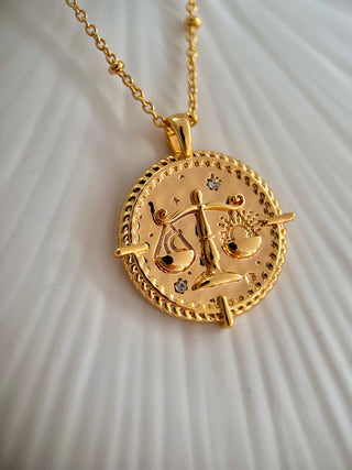 18k gold plated brass Libra star sign Zodiac Necklace with cubic zirconia stones and intricate detailing on a coin disc pendant and on fine ball chain - Gold Lunar