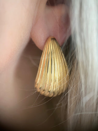 18k gold plated Ribbed Curved Earrings - Gold Lunar worn on model with blond hair