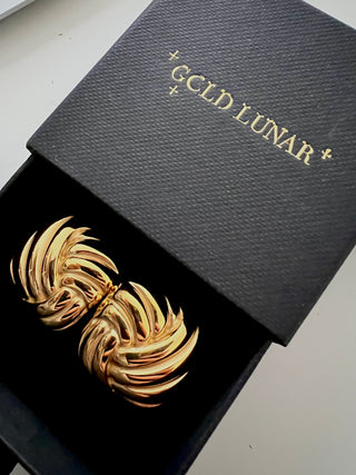 18k gold plated square knot stud earrings in a gold lunar jewellery box in black with gold font