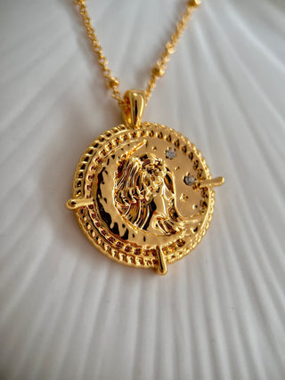 18k gold plated brass Virgo star sign Zodiac Necklace with cubic zirconia stones and intricate detailing on a coin disc pendant and on fine ball chain.