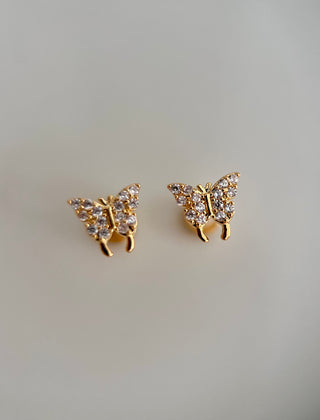 Cubic Zirconia butterfly stud earrings in 18k gold plating and cubic zirconia encrusted gemstones