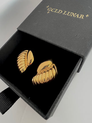 18k gold plated curve studs with ribbed detail displayed in black gold lunar gift box with gold branding