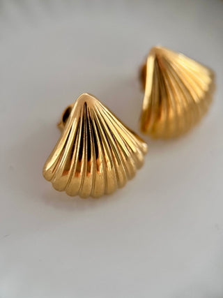 18k gold plated Curved Fan Studs earrings displayed on a white jewellery dish