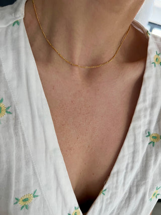 18k gold plated Fine Casual Chain worn on a model wearing a Nobody's Child white blouse with yellow flower embroidery - Gold Lunar