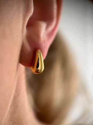 18k gold plated Mini Teardrop Stud Earrings worn on a model